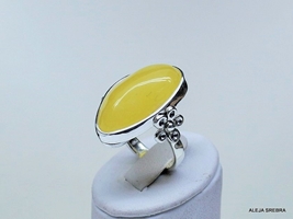 Wiosenka-pierścionek z żółciutkim bursztynem
